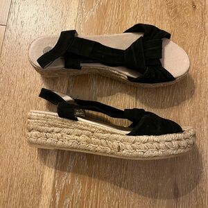 Eric Michael Sally espadrilles wedge black suede knot front detail